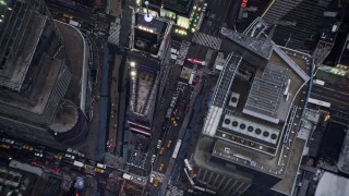 AX86_058 - 4K aerial stock footage a bird's eye view of traffic and tourists on 7th Avenue, Times Square in Midtown, New York City