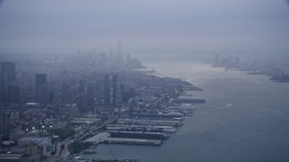 4K aerial stock footage of Lower Manhattan seen from Hudson River, New York City Aerial Stock Footage | AX86_082