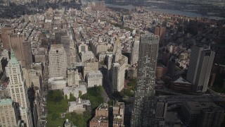 AX87_019 - 4K aerial stock footage Fly over Lower Manhattan skyscrapers, New York City Hall, New York, New York