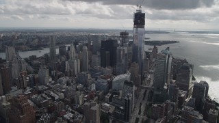 4K aerial stock footage Tilt to reveal One World Trade Center, Lower Manhattan, New York, New York Aerial Stock Footage | AX87_033