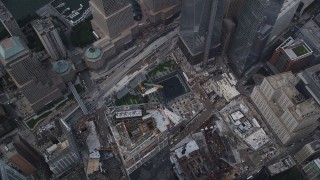 AX87_070 - 4K aerial stock footage Bird's eye view over World Trade Center Memorial, Lower Manhattan, New York