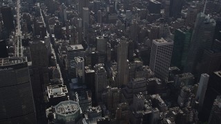 4K aerial stock footage Tilt up from Waldorf-Astoria, revealing Midtown Manhattan, New York, New York Aerial Stock Footage | AX87_083