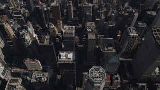 4K aerial stock footage Flying over Midtown Manhattan skyscrapers, tilt down, New York, New York Aerial Stock Footage | AX87_094