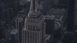 4K aerial stock footage Fly by top decks of the Empire State Building, Midtown Manhattan, New York Aerial Stock Footage | AX87_109