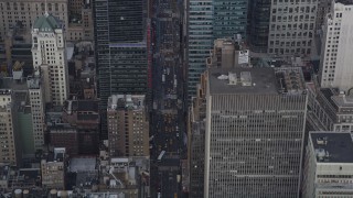 4K aerial stock footage Tilt up from 7th Avenue, revealing Times Square, Midtown Manhattan, New York Aerial Stock Footage | AX87_115