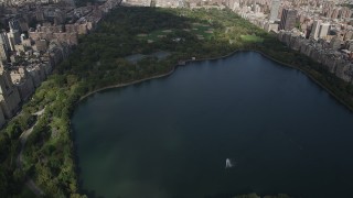 4K aerial stock footage Flying over Jacqueline Kennedy Onassis Reservoir, Central Park, New York, New York Aerial Stock Footage | AX87_122