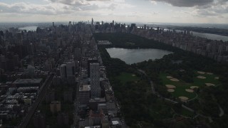 4K aerial stock footage Flying by Central Park, moving west, New York, New York Aerial Stock Footage | AX87_136