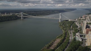 AX87_161 - 4K aerial stock footage Henry Hudson Parkway, George Washington Bridge, Hudson River, New York