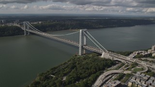 AX87_162 - 4K aerial stock footage Henry Hudson Parkway, George Washington Bridge, Hudson River, New York