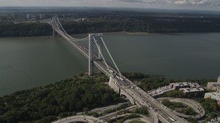 AX87_163 - 4K aerial stock footage Flying by the George Washington Bridge, Hudson River, New York, New York