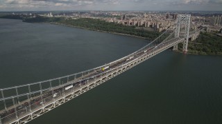 AX87_171 - 4K aerial stock footage Fly by George Washington Bridge, Hudson River, Washington Heights, New York