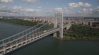 AX87_172 - 4K aerial stock footage Fly by George Washington Bridge, Hudson River, Washington Heights, New York