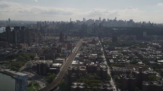 4K aerial stock footage Flying by the Midtown Manhattan skyline, seen from Harlem, New York, New York Aerial Stock Footage | AX87_180