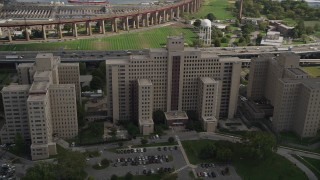 AX87_184 - 4K aerial stock footage Flying by the Manhattan Psychiatric Center, Wards Island, New York, New York