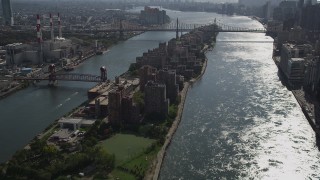 AX87_186 - 4K aerial stock footage Coler-Goldwater Specialty Hospital, Roosevelt Island, Queensboro Bridge, New York