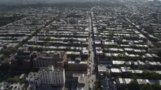 4K aerial stock footage of flying over row houses and city streets in Brooklyn, New York Aerial Stock Footage | AX88_018