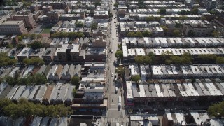 4K aerial stock footage of flying over 8th Avenue and row houses, Brooklyn, New York Aerial Stock Footage | AX88_026