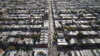 4K aerial stock footage of flying over 8th Avenue and row houses, Brooklyn, New York Aerial Stock Footage | AX88_027