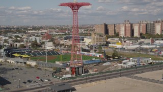 AX88_050 - 4K aerial stock footage pan from Parachute Jump revealing Luna Park, Coney Island, Brooklyn, New York