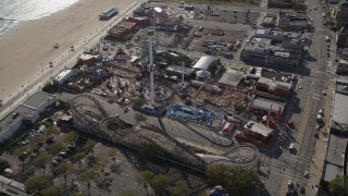 4K aerial stock footage of flying by rides and beach at Luna Park in Coney Island, Brooklyn, New York, New York Aerial Stock Footage | AX88_057