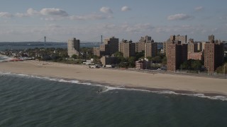 4K aerial stock footage of apartment buildings and Coney Island Beach in Brooklyn, New York Aerial Stock Footage | AX88_065