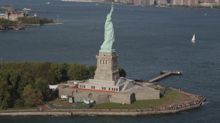 4K aerial stock footage of approaching the Statue of Liberty, New York, New York Aerial Stock Footage | AX88_097