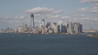 4K aerial stock footage of the Lower Manhattan skyline, seen from New York Harbor, New York Aerial Stock Footage | AX88_100