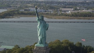 4K aerial stock footage of flying by the front side of the Statue of Liberty, New York, New York Aerial Stock Footage | AX88_107