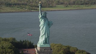 AX88_108 - 4K aerial stock footage of the front side of the Statue of Liberty, New York, New York