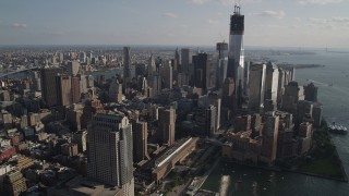 4K aerial stock footage flyby Freedom Tower and World Trade Center skyscrapers, Lower Manhattan, New York Aerial Stock Footage | AX88_136