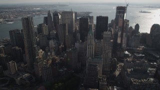 4K aerial stock footage of flying by Woolworth Building and 8 Spruce Street skyscrapers, Lower Manhattan, New York Aerial Stock Footage | AX88_139