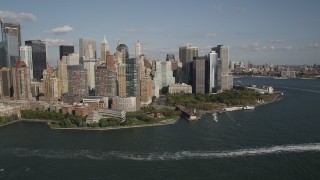 AX88_157 - 4K aerial stock footage of flying by Battery Park and Lower Manhattan skyscrapers, New York, New York