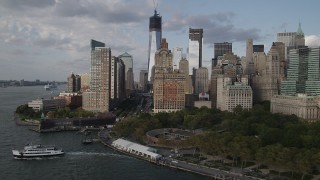 4K aerial stock footage of Freedom Tower, seen while passing Battery Park, Lower Manhattan, New York Aerial Stock Footage | AX88_164