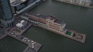 AX88_167 - 4K aerial stock footage of the Hyatt Regency Jersey City on the Hudson hotel in Downtown Jersey City, New Jersey