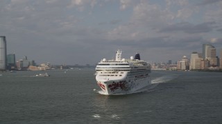 4K aerial stock footage of flying by cruise ship in New York Harbor, New York, New York Aerial Stock Footage | AX88_189