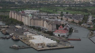 4K aerial stock footage of flying by waterfront condominium complexes, Port Liberte, New Jersey Aerial Stock Footage | AX88_196