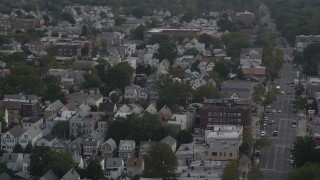 4K aerial stock footage of passing by urban residential neighborhoods, Jersey City, New Jersey Aerial Stock Footage | AX88_200