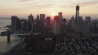 4K aerial stock footage Flying by Lower Manhattan skyscrapers, New York, New York, sunset Aerial Stock Footage | AX89_013