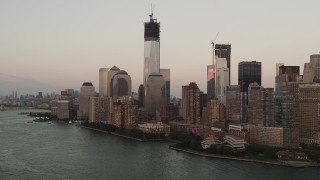 AX89_021 - 4K aerial stock footage of One World Trade Center, One World Financial Center, Lower Manhattan, New York, sunset