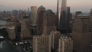 4K aerial stock footage of World Trade Center Memorial, Two World Trade Center, Lower Manhattan, New York, sunset Aerial Stock Footage | AX89_023