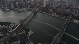 4K aerial stock footage of the Brooklyn Bridge, Manhattan Bridge, Lower Manhattan, New York, twilight Aerial Stock Footage | AX89_034