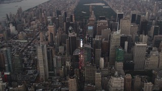 4K aerial stock footage Flying by Times Square, Midtown Manhattan, New York, New York, twilight Aerial Stock Footage | AX89_051