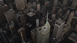 4K aerial stock footage Approaching Bank of America Tower, Midtown Manhattan, New York, twilight Aerial Stock Footage | AX89_054