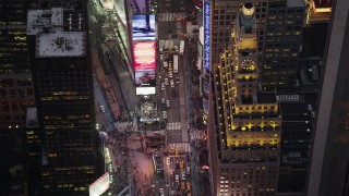 4K aerial stock footage Bird's eye view over Times Square, Midtown Manhattan, New York, twilight Aerial Stock Footage | AX89_075