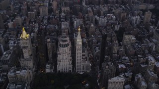 AX89_078 - 4K aerial stock footage of Madison Square Park, Metropolitan Life North Building, Metropolitan Life Insurance Tower, New York, twilight