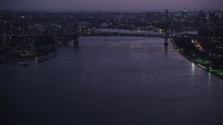 4K aerial stock footage Approaching Williamsburg Bridge, East River, New York, New York, twilight Aerial Stock Footage | AX89_115