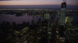 4K aerial stock footage Paning to One World Trade Center, Lower Manhattan, New York, twilight Aerial Stock Footage | AX89_133