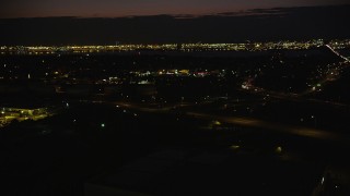 AX89_151 - 4K aerial stock footage of New Jersey Turnpike Extension, Highway 440 Interchange, Jersey City, New Jersey, night