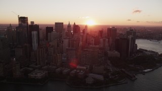 4K aerial stock footage Flying by Lower Manhattan skyscrapers, New York, New York, sunrise Aerial Stock Footage | AX90_011