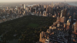 4K aerial stock footage Flying by Central Park, Midtown Manhattan, New York, New York, sunrise Aerial Stock Footage | AX90_043